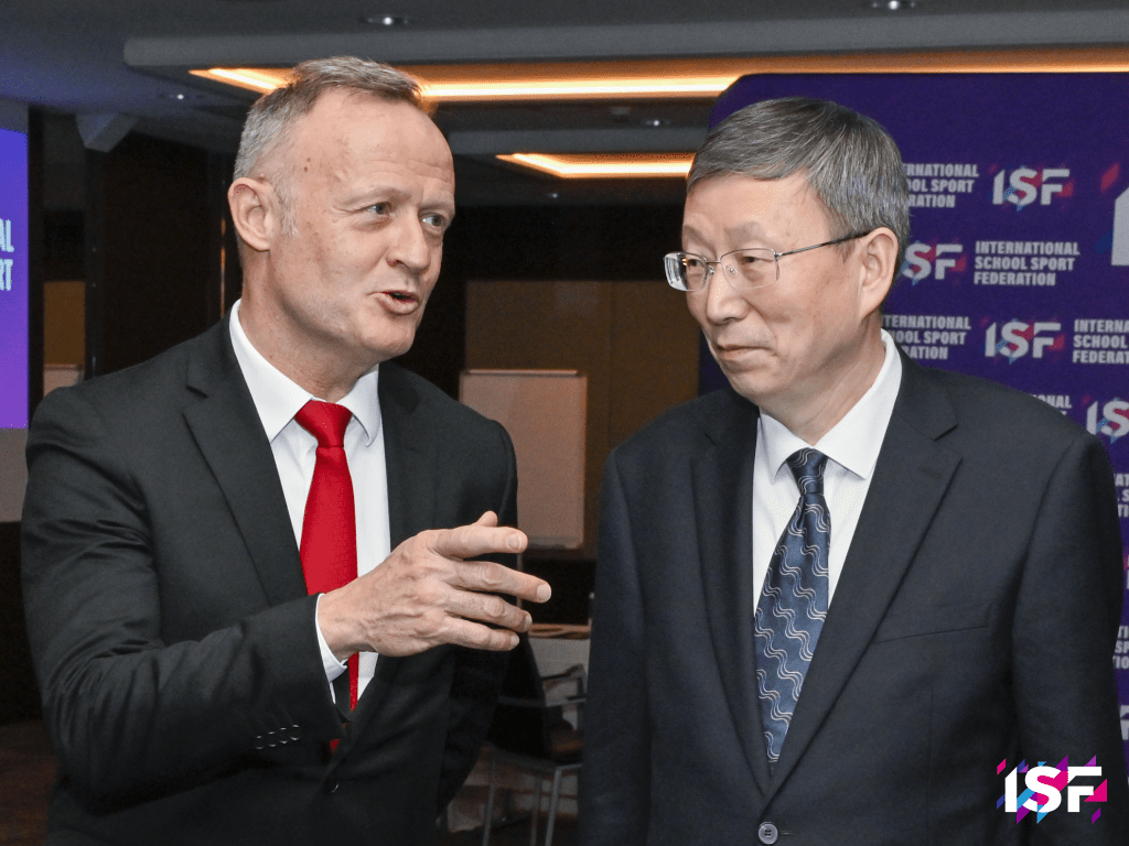 ISF President Laurent Patrynka talks with Jiayi Wang, China's Vice Minister of Education.