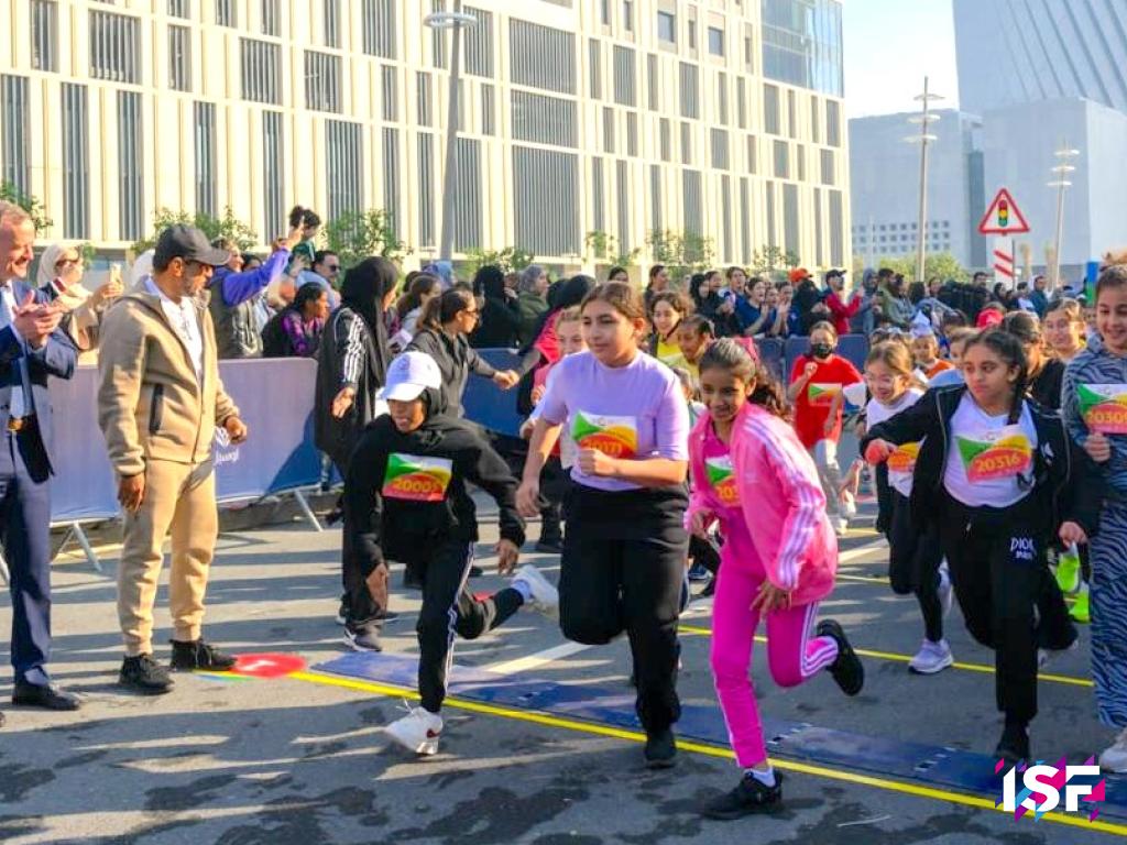 ISF President cheering for running kids in Qatar