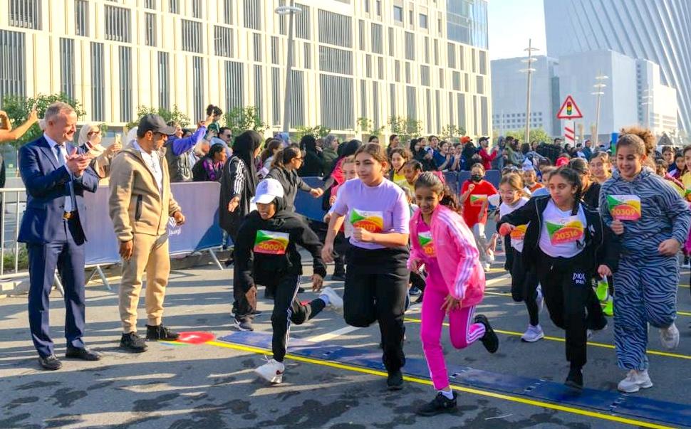 WhatsApp Image 2024-02-13 19.48.jpeg ISF President cheering for running kids in Qatar