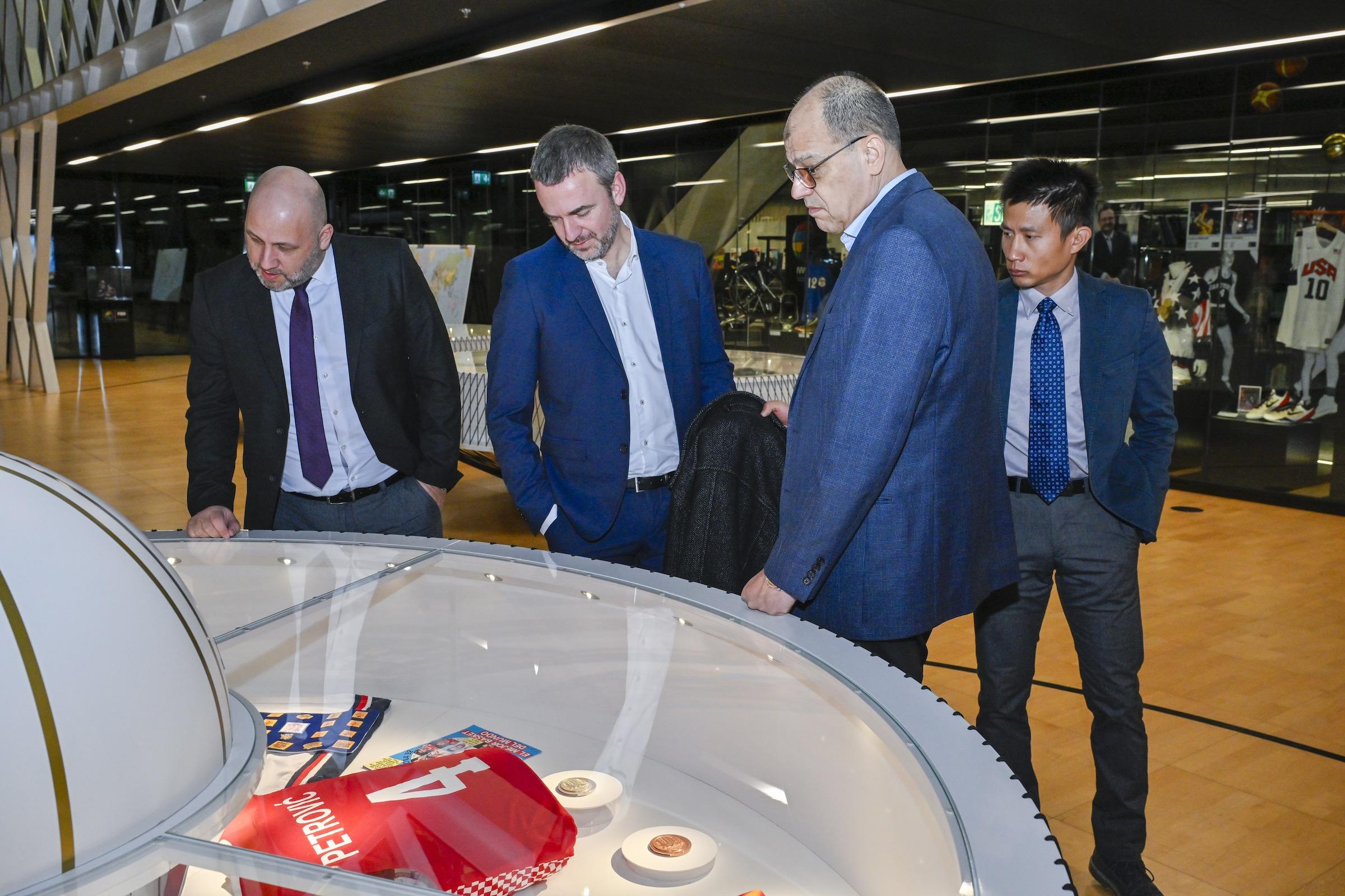 FIBA NF & Sports Senior Manager Kosta Iliev introduces FIBA museum to ISF Secteray General Hrvoje Custonja, Sport Director Josip Košutić & Communication & Marketing Manager Yuan Ren